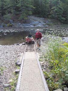 Hauling the canoe overland by trolley