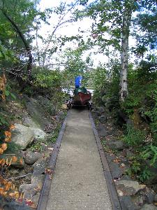 Hauling the canoe overland on a trolley