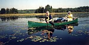 Paddling on lily-padded Club Lake - Algonquin Park