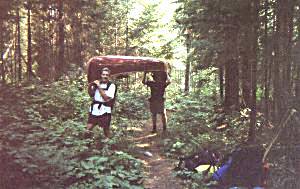Wayne and Norm Hooper portaging - Algonquin Park, Canada